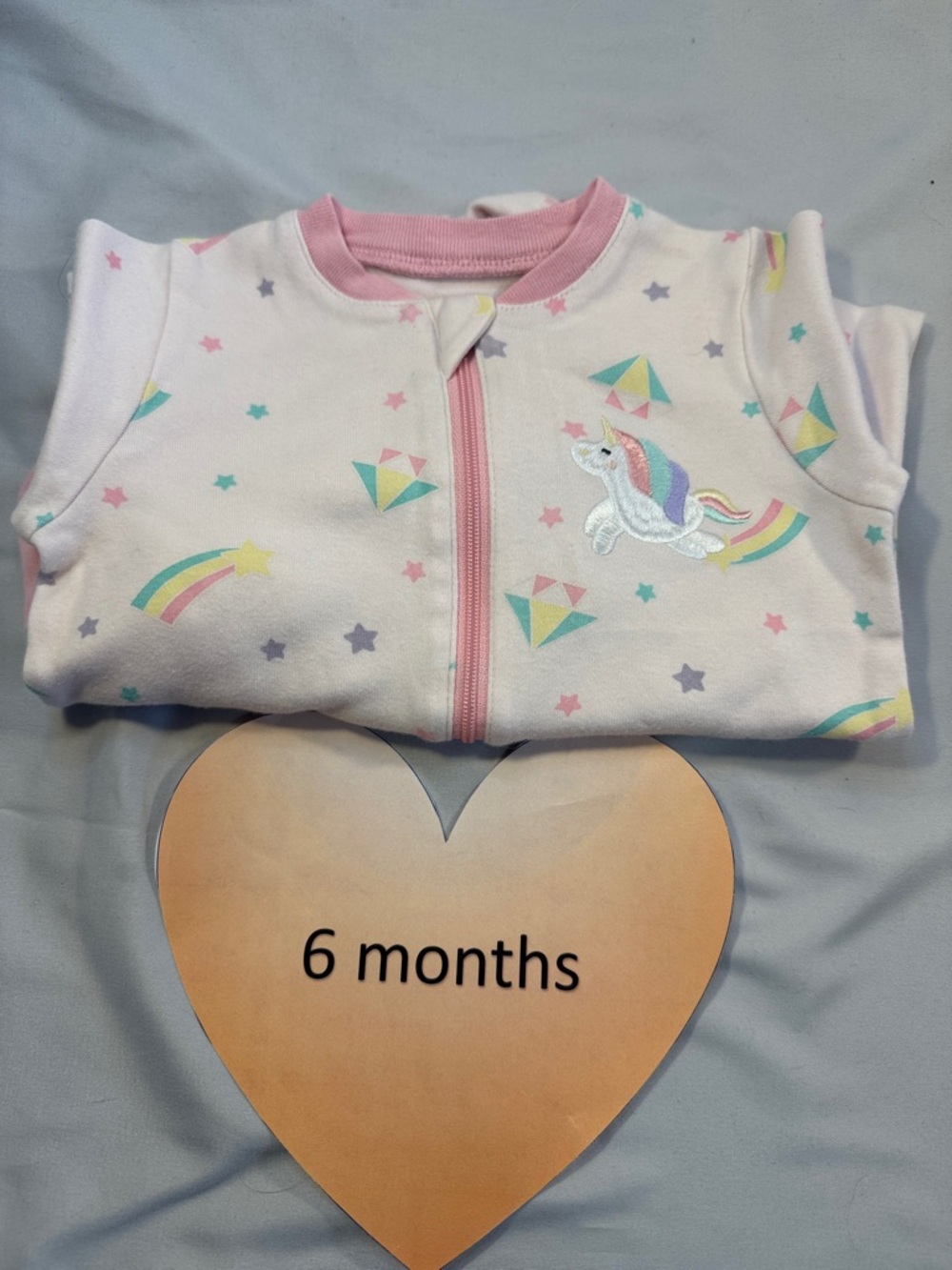 Tuffy Baby Onesie with Stars, rainbows, and embroidered unicorn